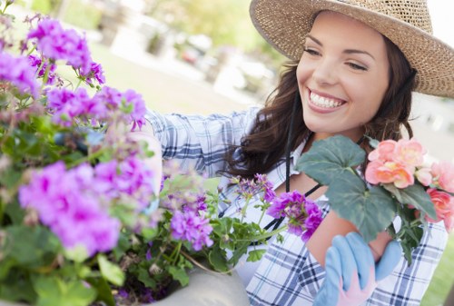 Person using a screen reader to access gardening service information on a mobile device